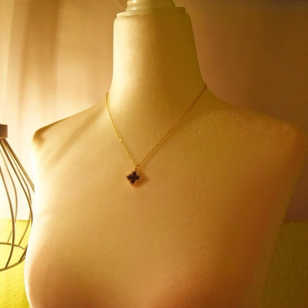 Gold Necklace with Black Clover Pendant